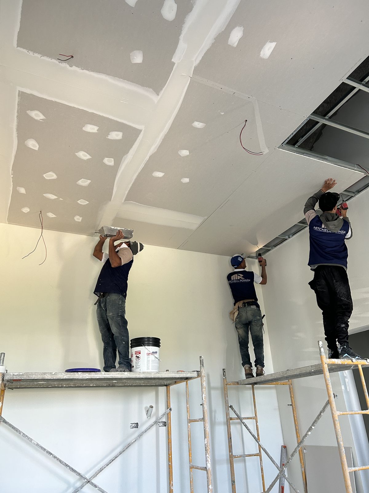 Workers doing interior finishing